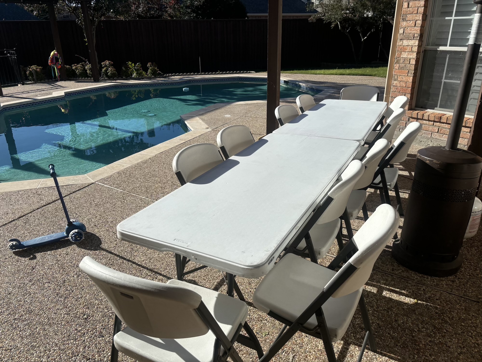 Table and chair rental setup in Dallas County backyard